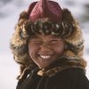9-year Janibek flashes a smile, Mongolian Altai in winter_BOY_NOMAD_aAron_Munson